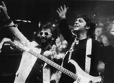 Ringo joins Paul on stage.